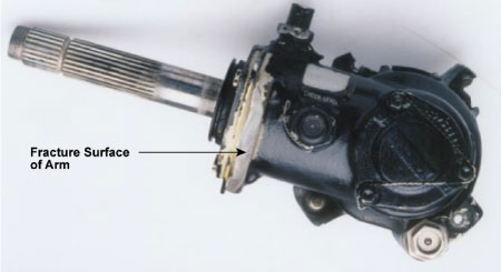 Photo of Tail rotor gearbox showing fracture of bell crank support arm